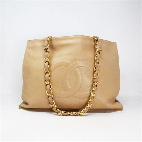 chanel xl gold canvas tote|Chanel handbags large tote bag.